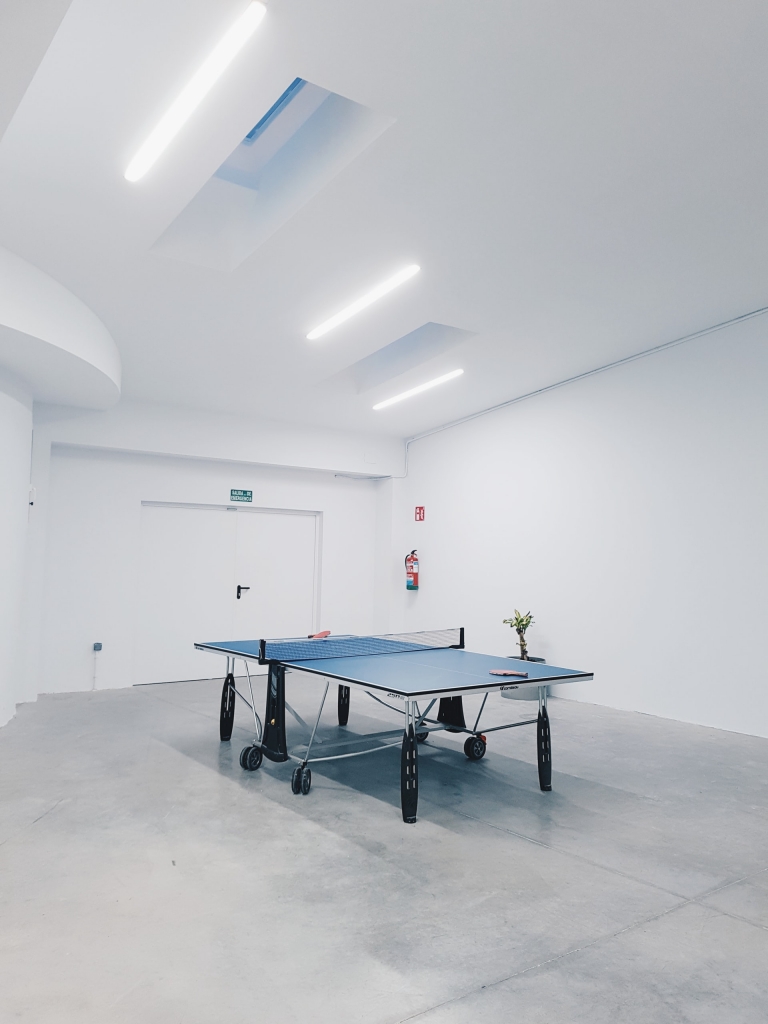 Fire extinguisher in a ping pong room