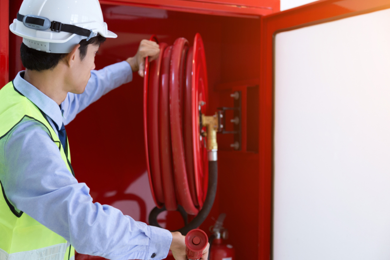 Engineer inspection Fire extinguisher and fire hose.